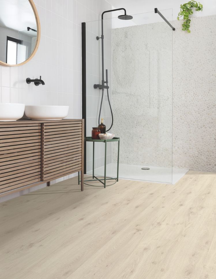 engineered hardwood floors in a bright MB bathroom