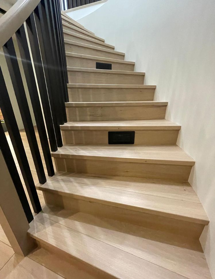 hardwood stair installation in a Steinbach, MB, home