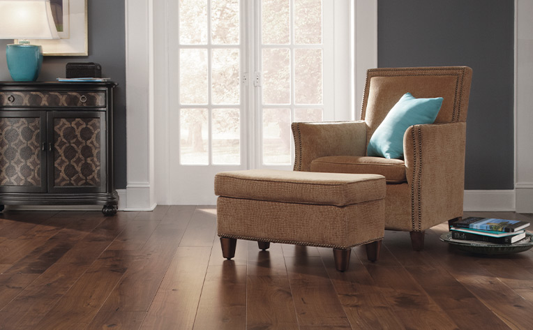 patina blue decor in living room with wood flooring