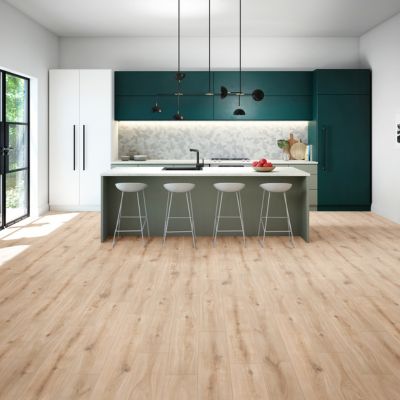 vinyl plank floors in a Steinbach kitchen with green cabinets